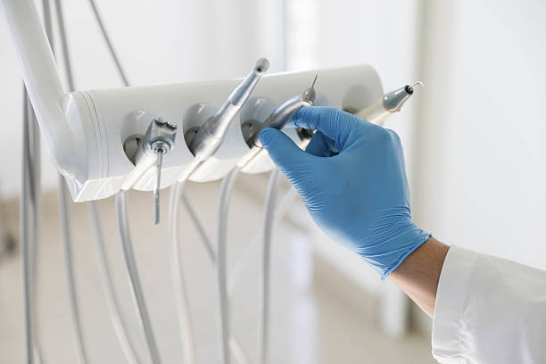 Professional Invisalign Clear Aligners technician working in Palm Valley, TX